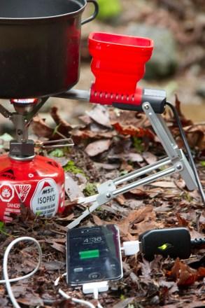 The FlameStower Thermo Charger, using your stove to charge your cell phone.